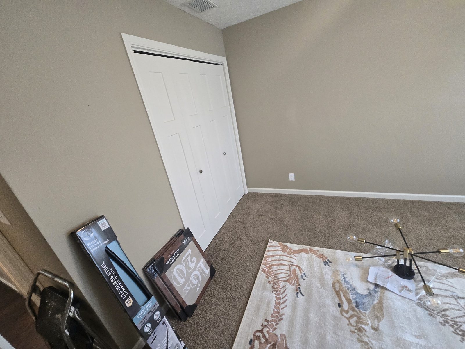 Closet wall of a Lafayette bedroom before wainscoting was added