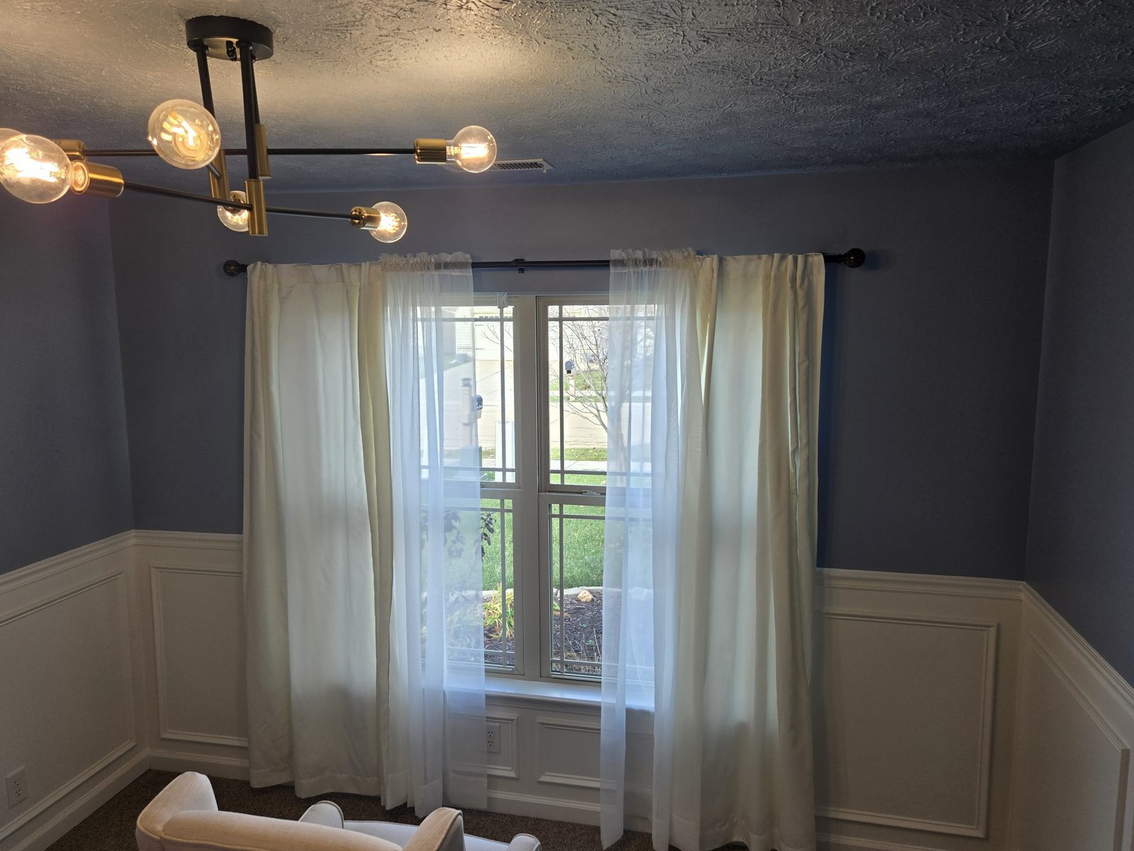 Completed window wall with wainscoting in a Lafayette bedroom